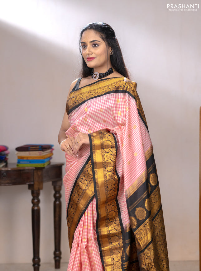 Pure gadwal silk saree pink and black with allover checked pattern & zari woven buttas and temple design annam zari woven border