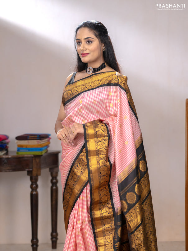 Pure gadwal silk saree pink and black with allover checked pattern & zari woven buttas and temple design annam zari woven border