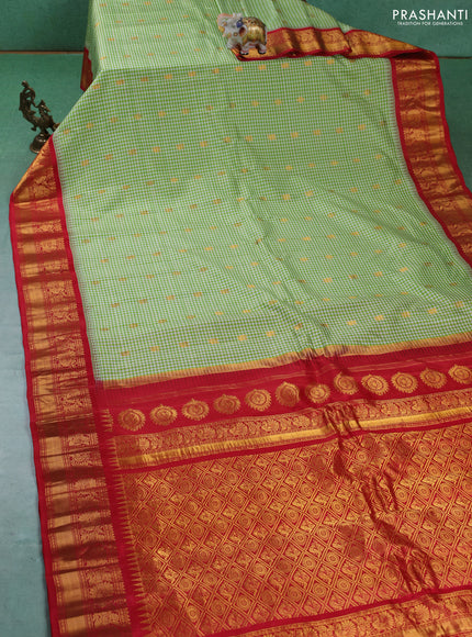 Pure gadwal silk saree off white light green and red with allover checked pattern & zari woven buttas and temple design annam zari woven border