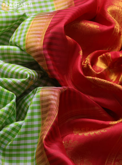 Pure gadwal silk saree off white light green and red with allover checked pattern & zari woven buttas and temple design annam zari woven border