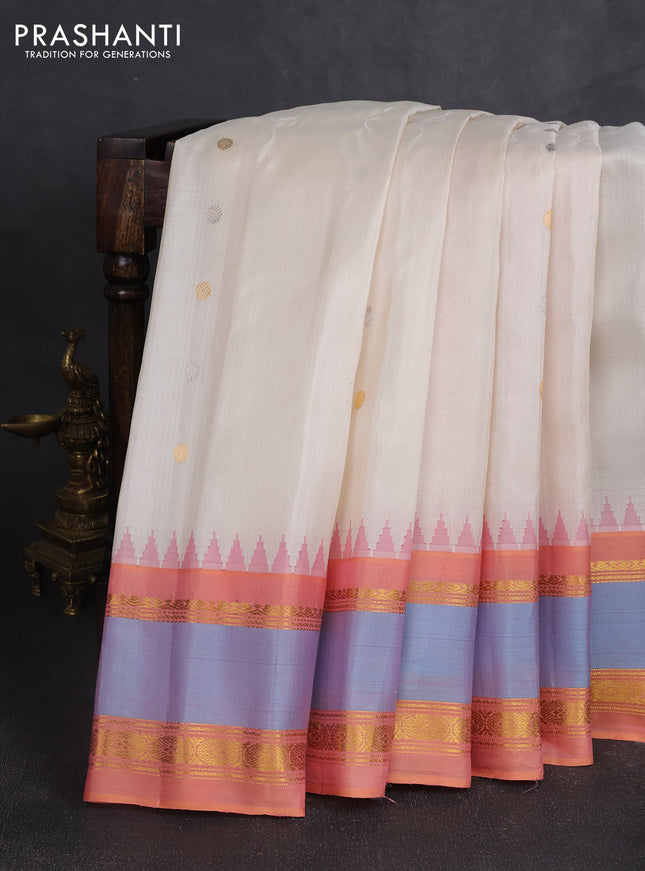 Pure gadwal silk saree cream and peach shade with silver & gold zari woven buttas and temple design rettapet zari woven border