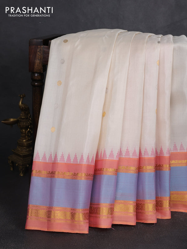 Pure gadwal silk saree cream and peach shade with silver & gold zari woven buttas and temple design rettapet zari woven border