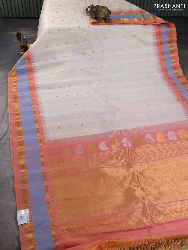 Pure gadwal silk saree cream and peach shade with silver & gold zari woven buttas and temple design rettapet zari woven border