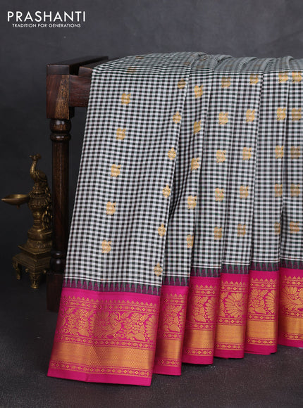 Pure gadwal silk saree off white bottle green and pink with allover checked pattern & zari woven buttas and temple design annam zari woven border