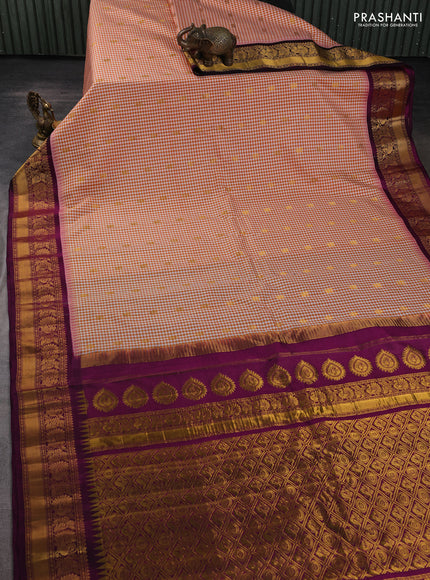 Pure gadwal silk saree off white orange and purple with allover checked pattern & zari woven buttas and temple design annam zari woven border