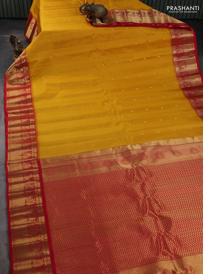 Pure gadwal silk saree yellow and red with zari woven buttas and temple design zari woven border