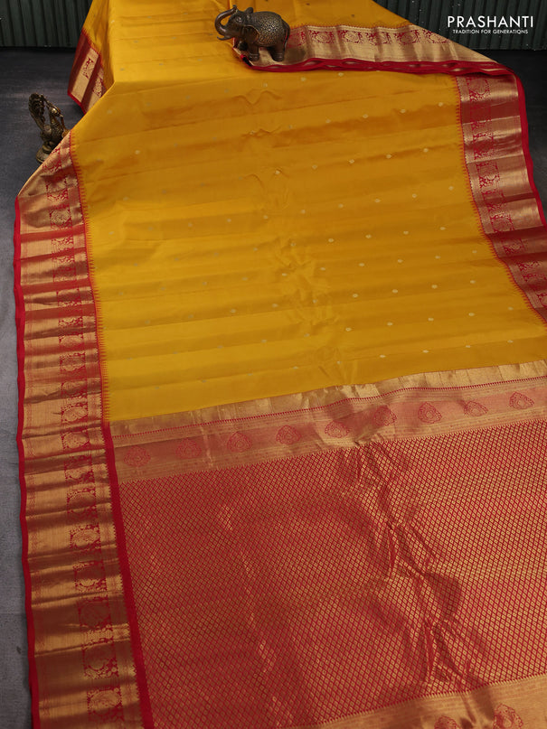 Pure gadwal silk saree yellow and red with zari woven buttas and temple design zari woven border
