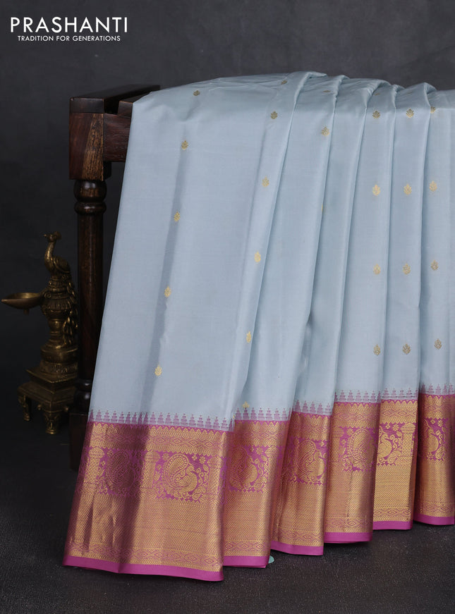 Pure gadwal silk saree grey and mauve pink with zari woven buttas and temple design zari woven border
