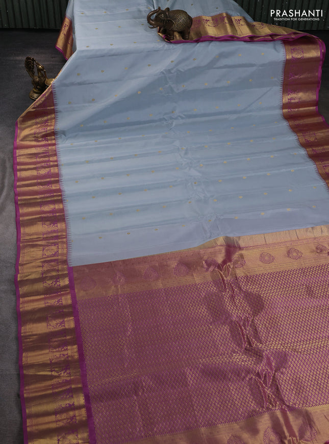 Pure gadwal silk saree grey and mauve pink with zari woven buttas and temple design zari woven border