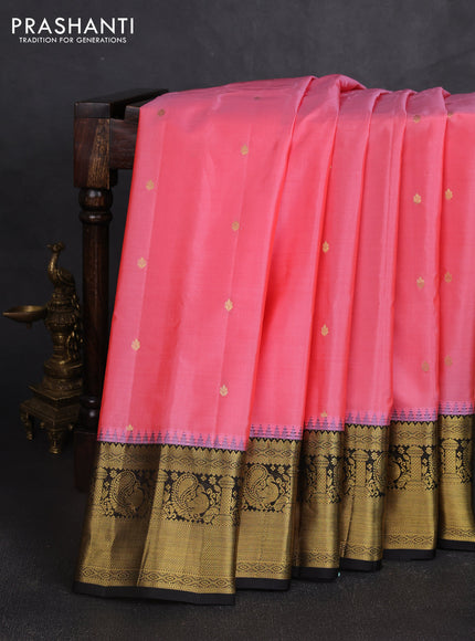 Pure gadwal silk saree peach pink and black with zari woven buttas and temple design zari woven border