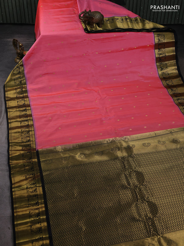 Pure gadwal silk saree peach pink and black with zari woven buttas and temple design zari woven border
