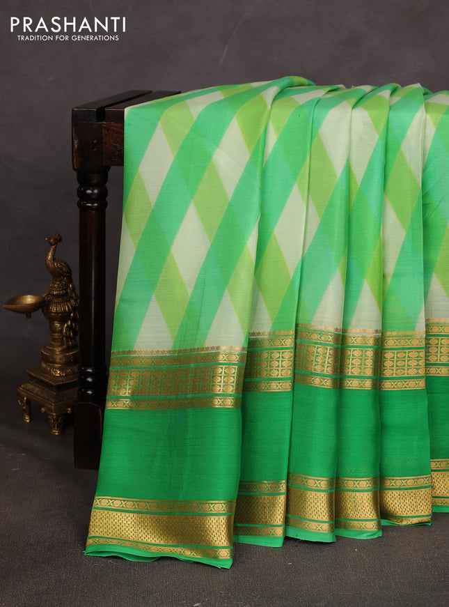 Pure mysore silk saree light green with allover geometic prints and rettapet zari woven border