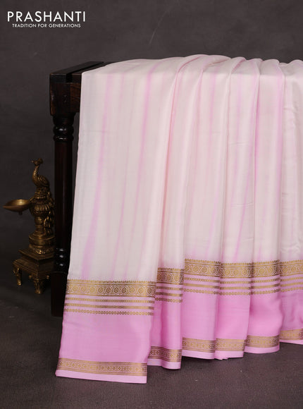 Pure mysore silk saree light pink with allover shibori prints and rettapet zari woven border