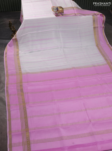 Pure mysore silk saree light pink with allover shibori prints and rettapet zari woven border