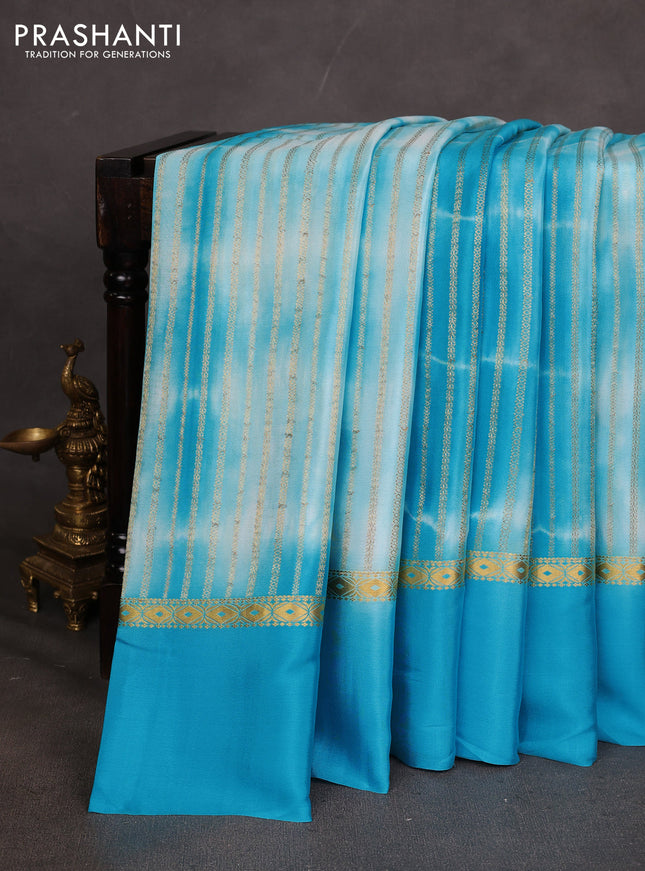 Pure mysore silk saree cs blue with allover zari weaves & shibori prints and zari woven simple border