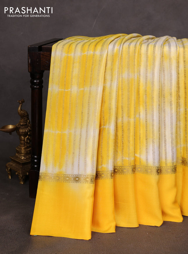 Pure mysore silk saree yellow with allover zari weaves & shibori prints and zari woven simple border