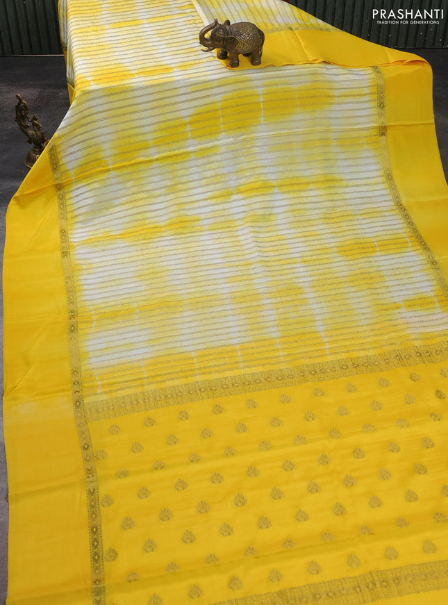 Pure mysore silk saree yellow with allover zari weaves & shibori prints and zari woven simple border