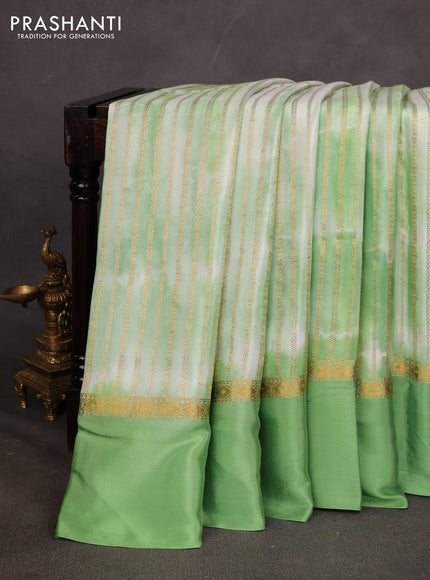 Pure mysore silk saree light green with allover zari weaves & shibori prints and zari woven simple border