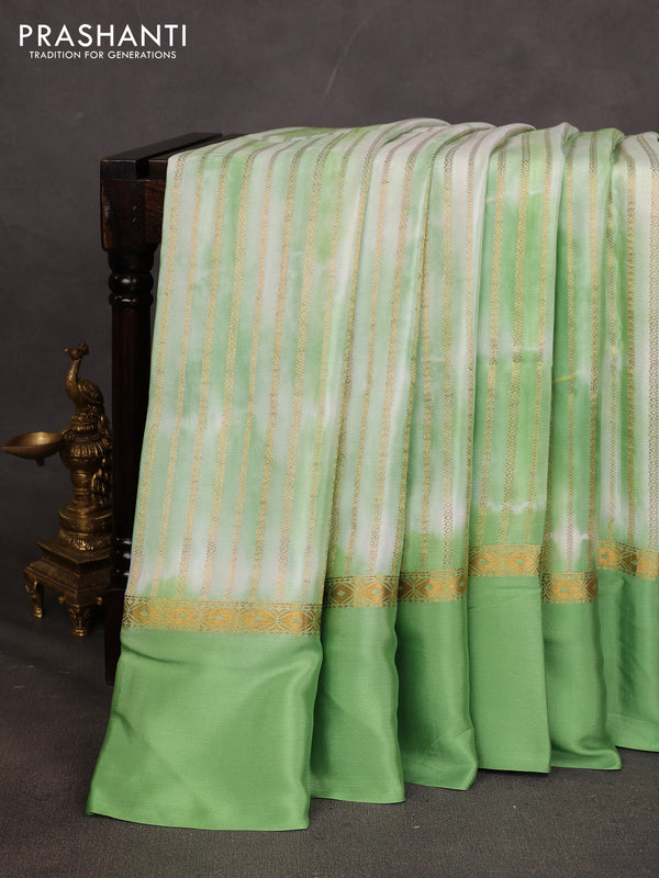 Pure mysore silk saree light green with allover zari weaves & shibori prints and zari woven simple border
