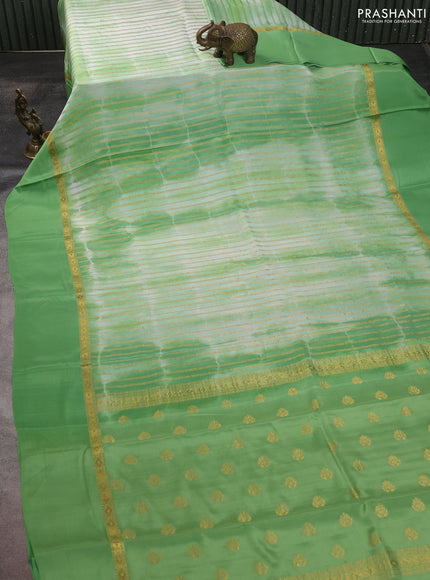 Pure mysore silk saree light green with allover zari weaves & shibori prints and zari woven simple border