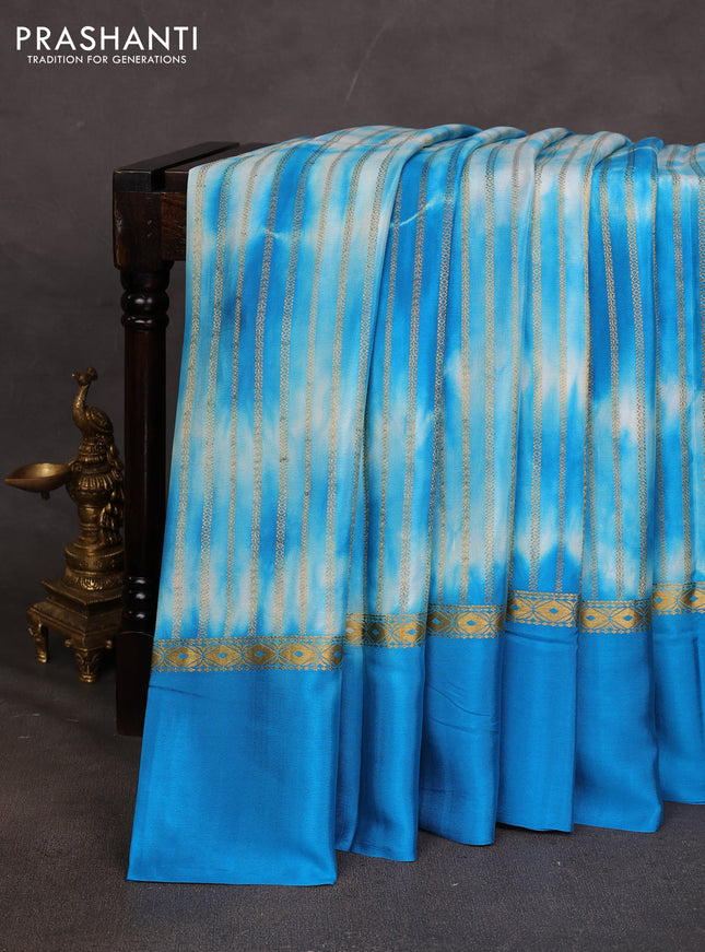 Pure mysore silk saree cs blue with allover zari weaves & shibori prints and zari woven simple border
