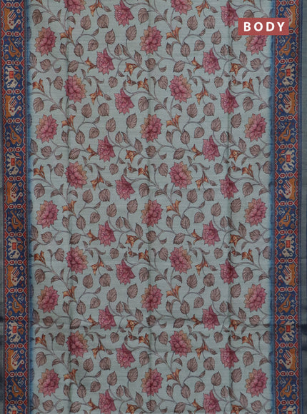 Art tussar saree pastel blue and peacock blue with allover kalamkari prints and patola border