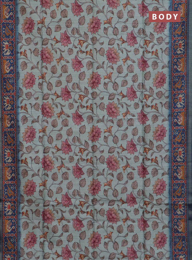 Art tussar saree pastel blue and peacock blue with allover kalamkari prints and patola border