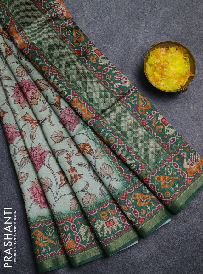 Art tussar saree pastel green and green with allover kalamkari prints and patola border