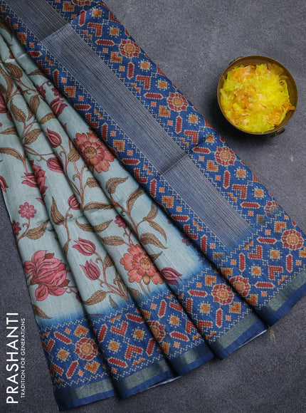 Art tussar saree pastel blue and blue with allover kalamkari prints and patola border