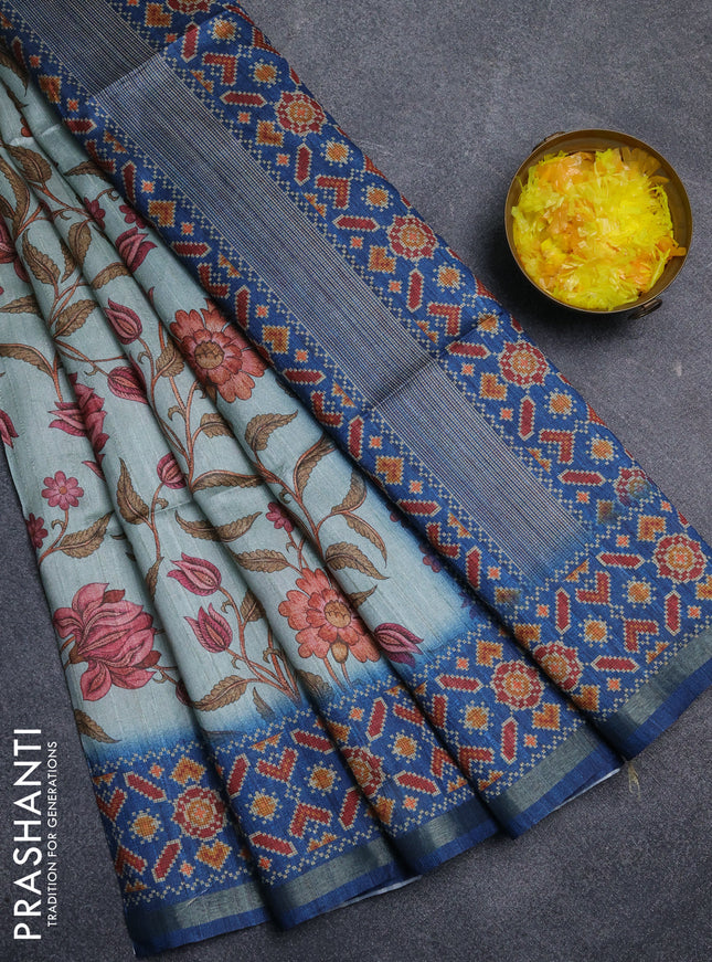 Art tussar saree pastel blue and blue with allover kalamkari prints and patola border
