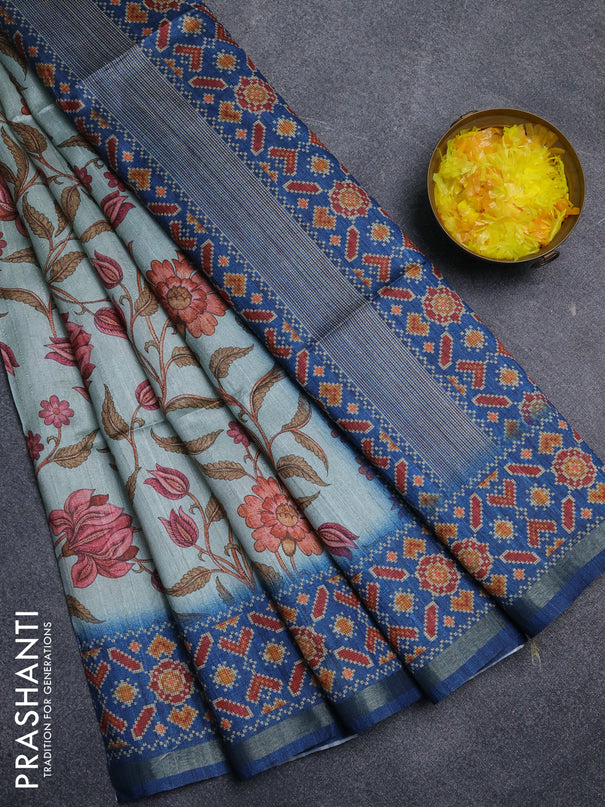 Art tussar saree pastel blue and blue with allover kalamkari prints and patola border