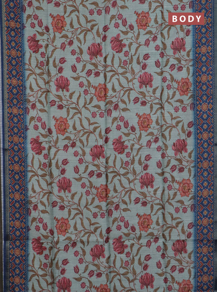 Art tussar saree pastel blue and blue with allover kalamkari prints and patola border