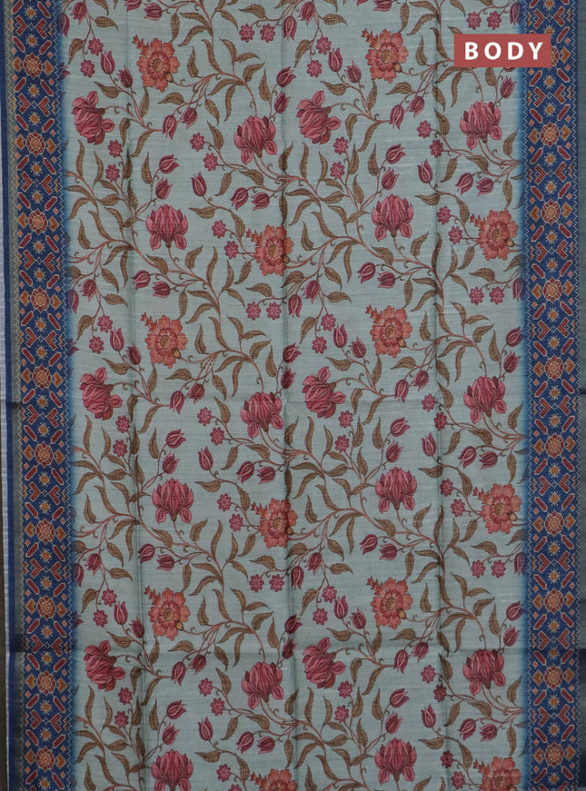 Art tussar saree pastel blue and blue with allover kalamkari prints and patola border