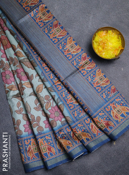 Art tussar saree pastel blue and peacock blue with allover kalamkari prints and patola border