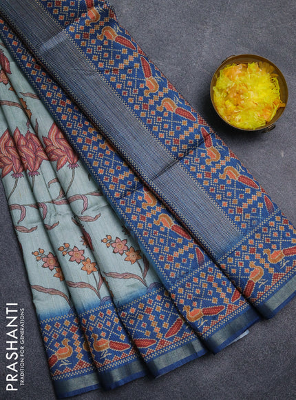 Art tussar saree pastel blue and peacock blue with allover kalamkari prints and patola border