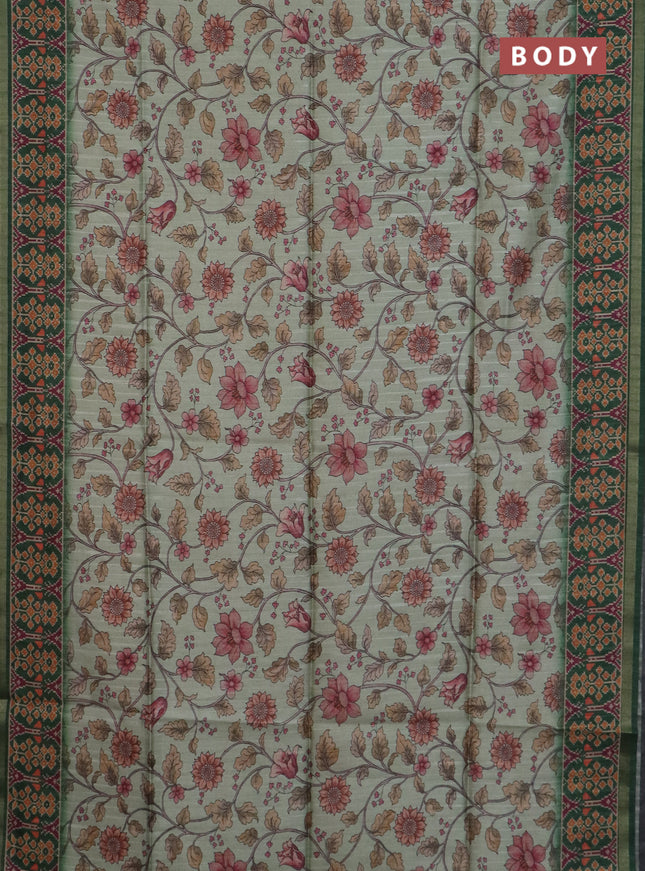 Art tussar saree pastel green and green with allover kalamkari prints and patola border