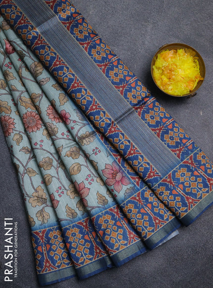 Art tussar saree pastel blue and peacock blue with allover kalamkari prints and patola border
