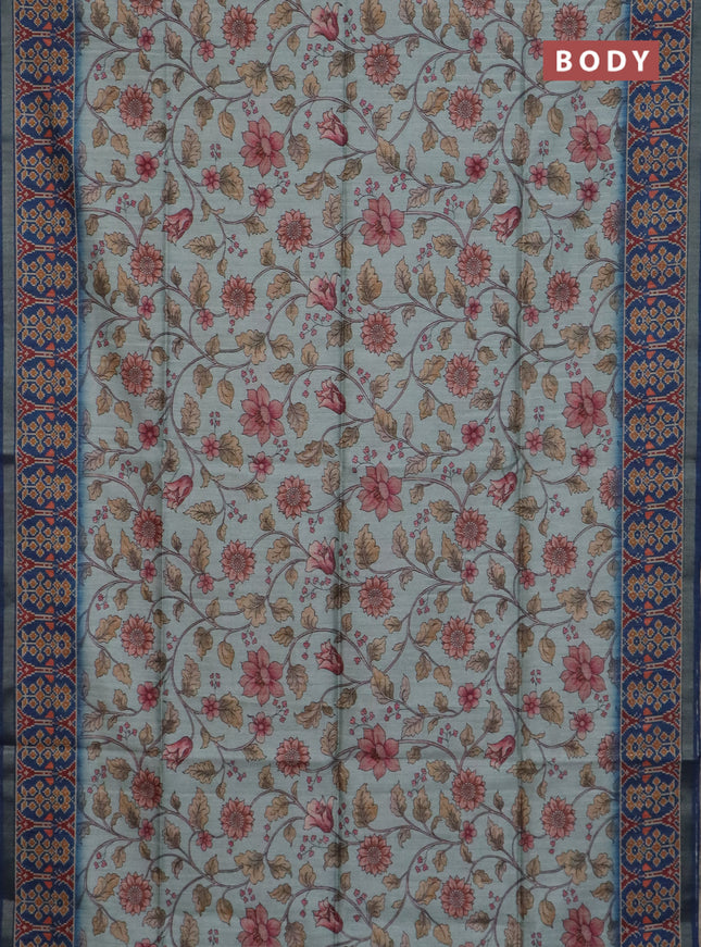 Art tussar saree pastel blue and peacock blue with allover kalamkari prints and patola border