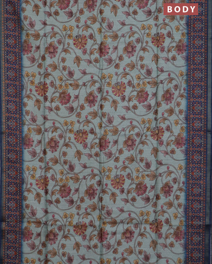Art tussar saree pastel blue and peacock blue with allover kalamkari prints and patola border