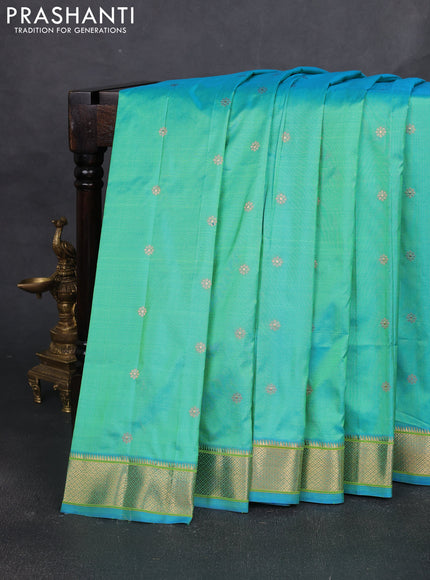 Pure paithani silk saree dual shade of teal bluish green and red with allover zari woven buttas and paithani weaving pallu