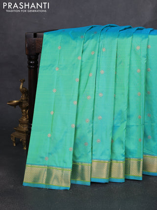 Pure paithani silk saree dual shade of teal bluish green and red with allover zari woven buttas and paithani weaving pallu