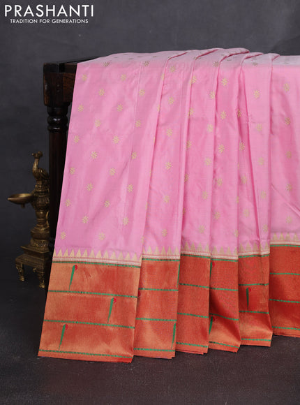 Pure paithani silk saree light pink and red with allover zari woven buttas and long zari woven muniya butta border