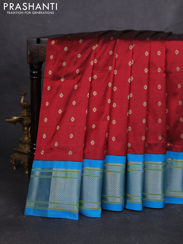 Pure paithani silk saree maroon and cs blue with allover zari woven buttas and paithani weaving pallu
