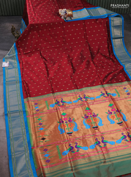 Pure paithani silk saree maroon and cs blue with allover zari woven buttas and paithani weaving pallu