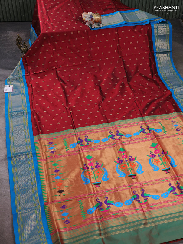 Pure paithani silk saree maroon and cs blue with allover zari woven buttas and paithani weaving pallu