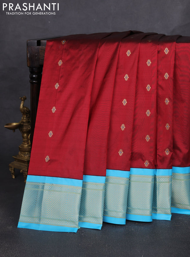 Pure paithani silk saree maroon and light blue with allover zari woven buttas and paithani weaving pallu