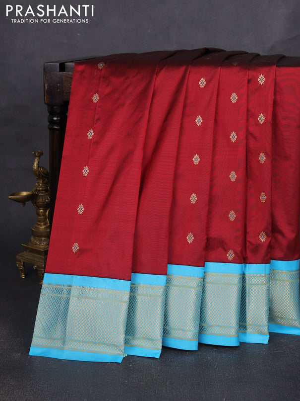 Pure paithani silk saree maroon and light blue with allover zari woven buttas and paithani weaving pallu