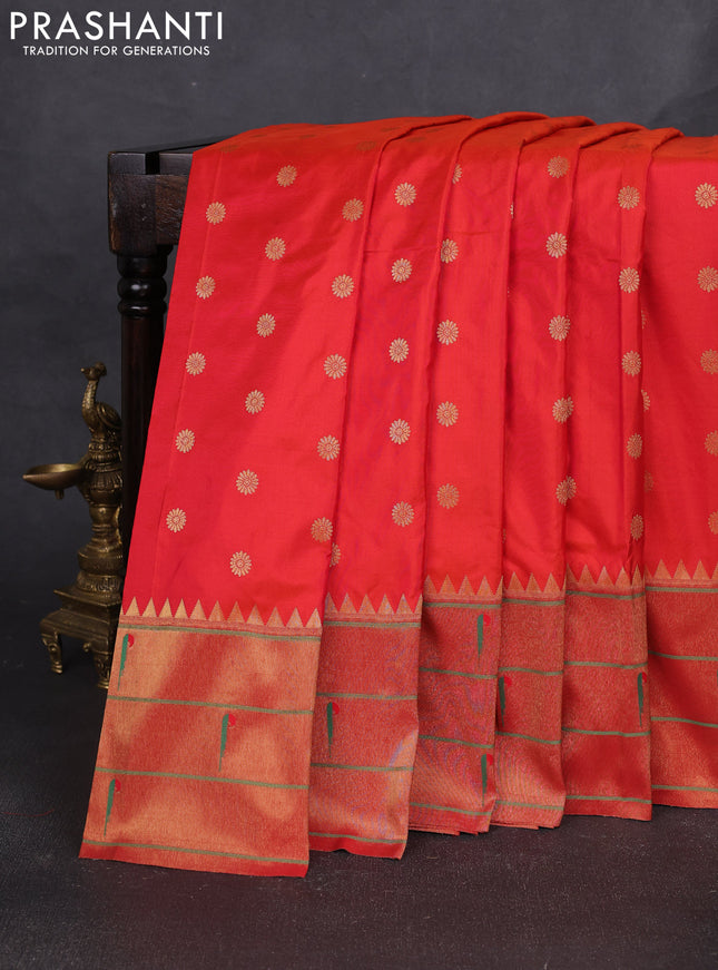 Pure paithani silk saree dual shade of pinkish orange and red with allover zari woven buttas and zari woven muniya butta border