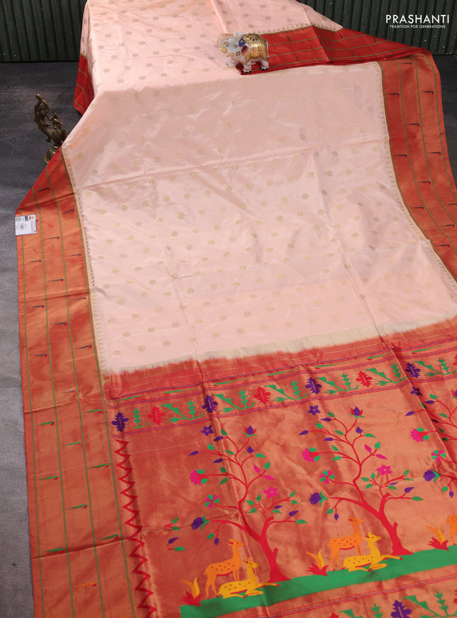 Pure paithani silk saree pale orange and red with allover zari woven floral buttas and zari woven muniya butta border