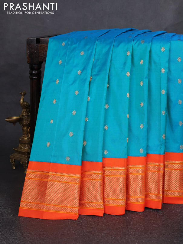 Pure paithani silk saree dual shade of teal bluish green and orange with allover zari woven buttas and paithani weaving pallu
